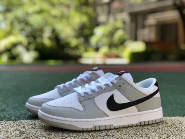 Кроссовки для скейтборда Nike Dunk Low с низким берцем и защитой от сажи Dunk серо-бело-черного цвета DR9654-001